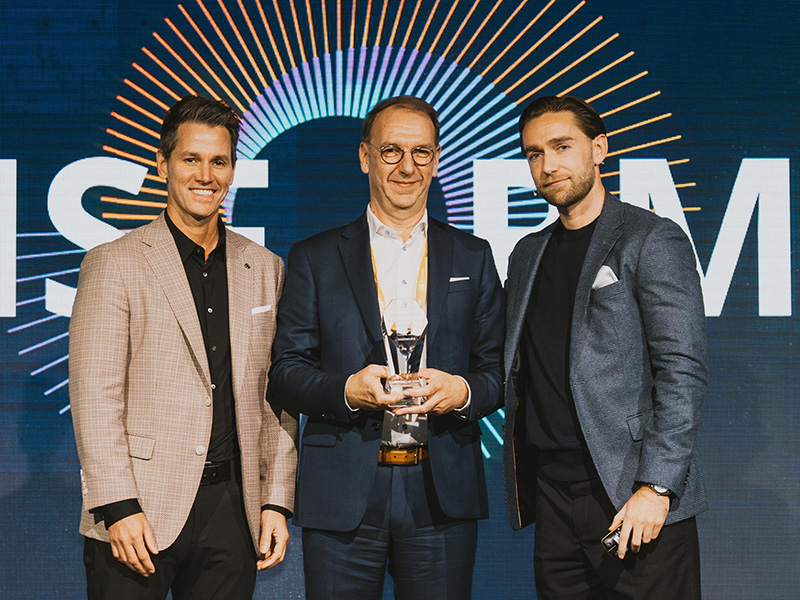 JP Cussac collecting Tricentis AI Trailblazer award